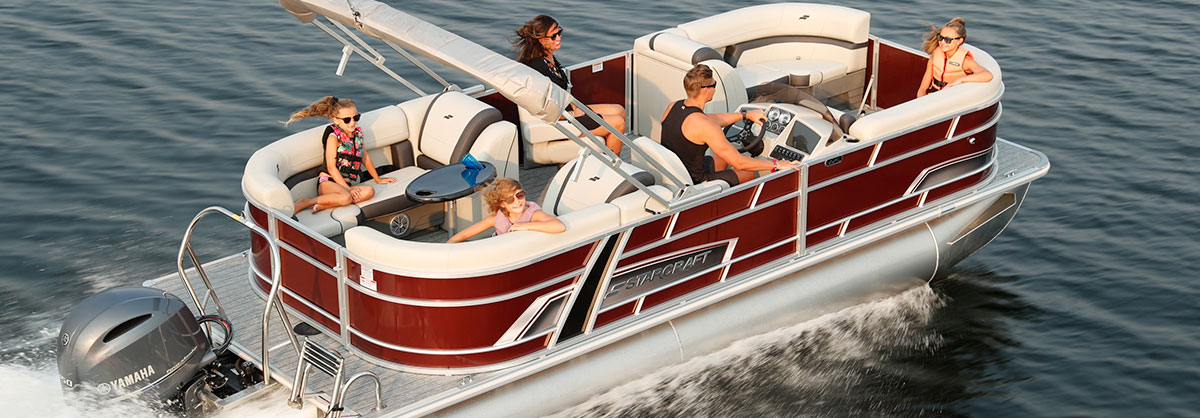 People riding on a pontoon boat