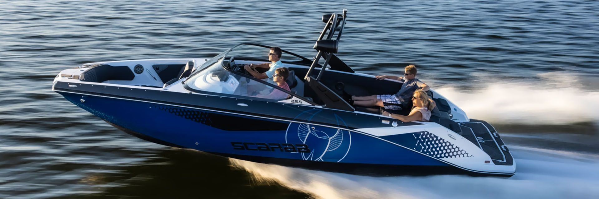 People riding on a Scarab Jetboat